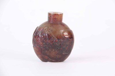 Lot 97 - A 19TH CENTURY CHINESE CARVED RUSSETT JADE...