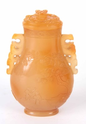 Lot 98 - A WELL CARVED CHINESE JADE LIDDED VASE of...
