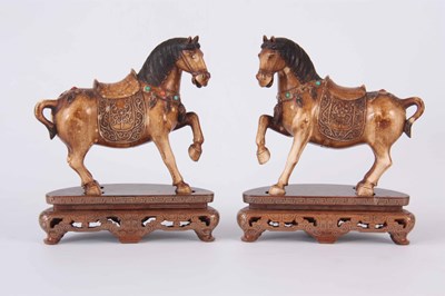 Lot 117 - A PAIR OF CHINESE IVORY TANG HORSES mounted...