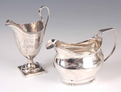 Lot 149 - TWO GEORGE III SILVER CREAM JUGS the first of...