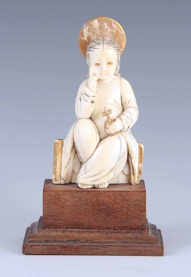 Lot 393 - AN EARLY INDO PORTUGUESE CARVED IVORY FIGURE...