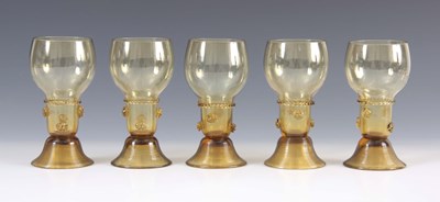 Lot 10 - A SET OF 5 CONTINENTAL PALE AMBER WINE GLASSES...
