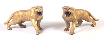 Lot 128 - A PAIR OF CARVED GILTWOOD TIGERS.