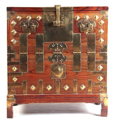 Lot 130 - AN 18TH CENTURY CHINESE ELM CHEST with brass...