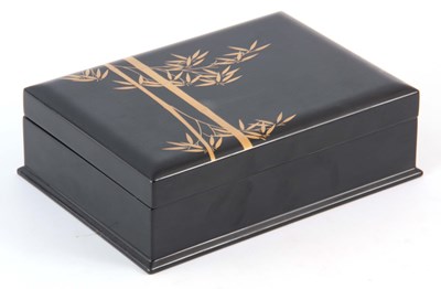 Lot 151 - A 20TH CENTURY JAPANESE EBONISED LAQUERED BOX...