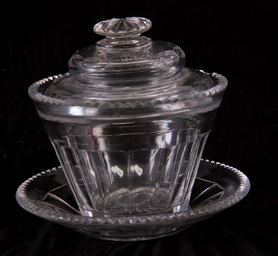 Lot 17 - AN ANGLO IRISH GEORGIAN CUT GLASS LIDDED...