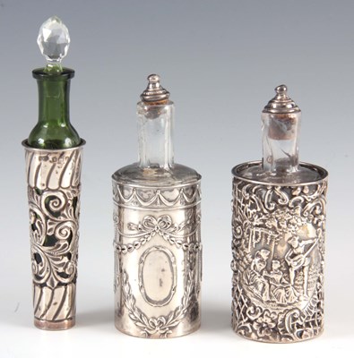 Lot 206 - A GREEN GLASS AND SILVER SCENT BOTTLE with two...