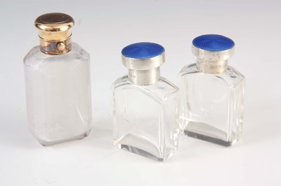 Lot 207 - A PAIR OF SILVER ENAMEL TOPPED BOTTLES and a...