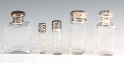 Lot 208 - A SELECTION OF FIVE SILVER TOPPED BOTTLES...