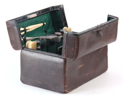 Lot 214 - A GREEN LEATHER FITTED VANITY CASE BY DREW &...