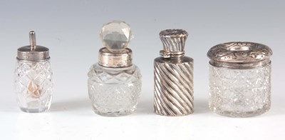 Lot 216 - A SELECTION OF 3 CUT GLASS AND SILVER BOTTLES...