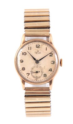 Lot 255 - A 9CT GOLD SMITHS DE LUXE WRIST WATCH with...