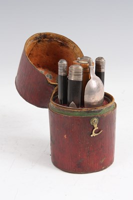 Lot 567 - A GEORGE III CYLINDRICAL RED LEATHER CASED...