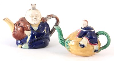 Lot 48 - TWO 19TH CENTURY MAJOLICA TEAPOTS, possibly...