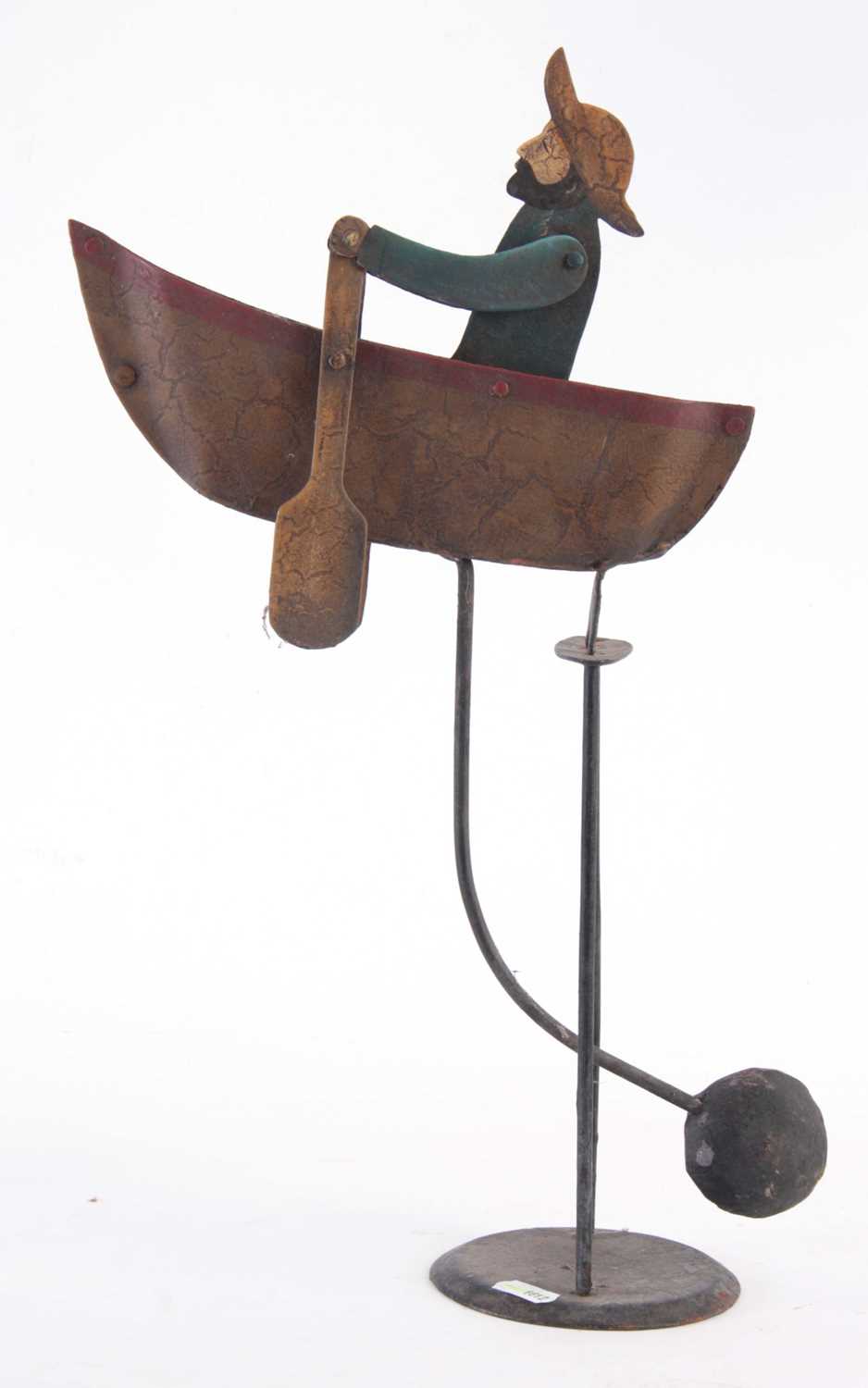 Lot 511 - A FOLK ART PAINTED STEEL AUTOMATON ROWING BOAT,...