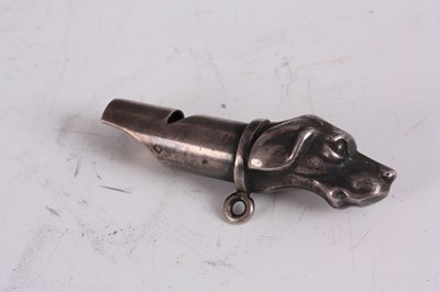 Lot 576 - AN EDWARDIAN DOGS HEAD SILVER WHISTLE...