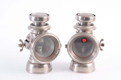 Lot 730 - A PAIR OF NICKLE PLATED BRASS LUCAS 146...