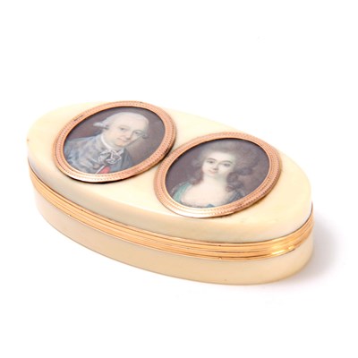 Lot 310 - A GEORGE III GOLD MOUNTED IVORY SNUFF BOX IN...