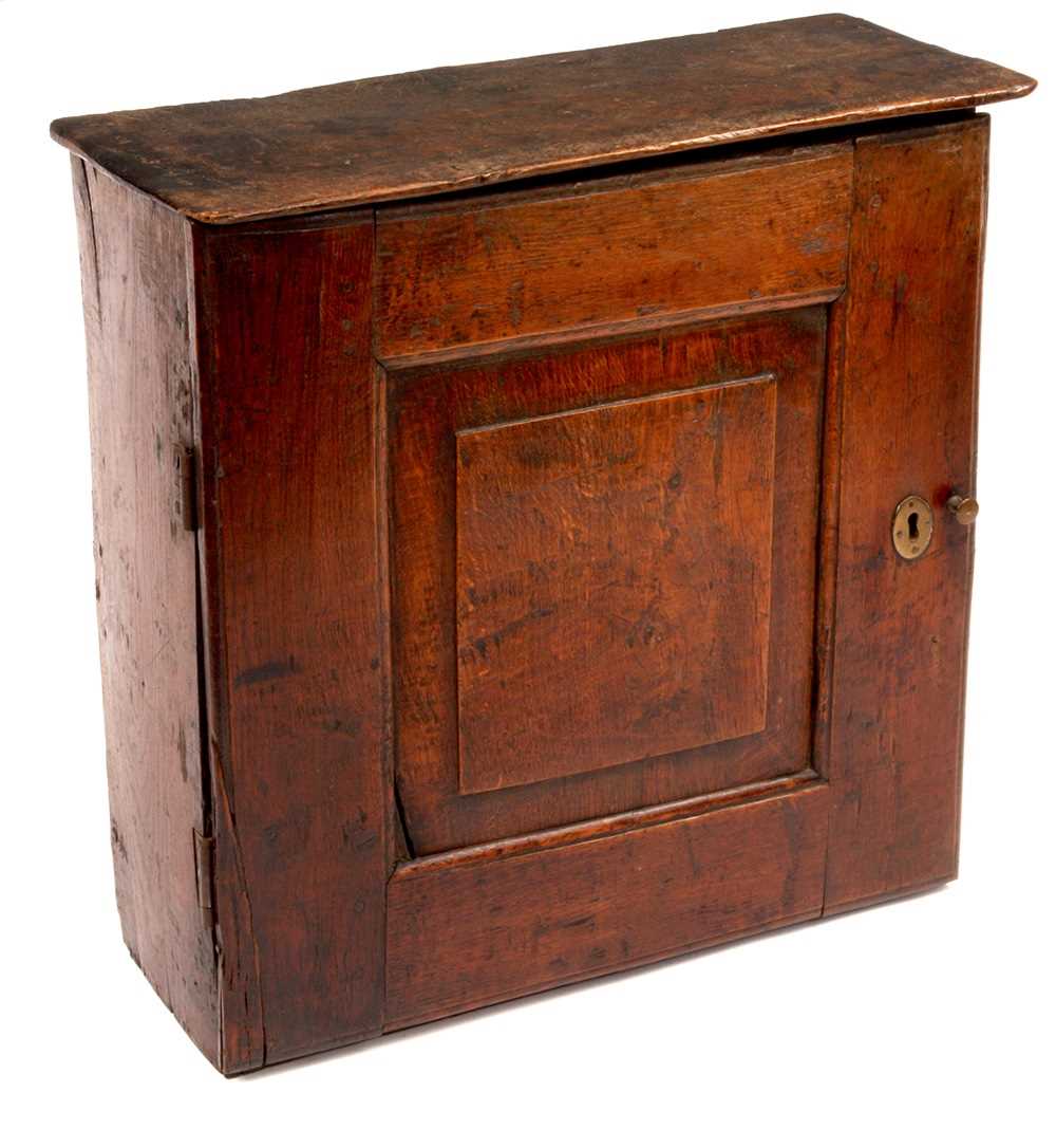 Lot 852 - AN EARLY 18TH CENTURY OAK PRIMITIVE HANGING