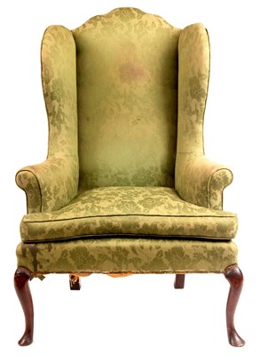 Lot 877 - A GEORGE I WALNUT WINGBACK ARMCHAIR of...