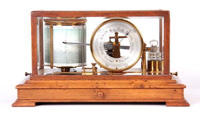 Lot 568 - AN EARLY 20th CENTURY OAK CASED BAROGRAPH...